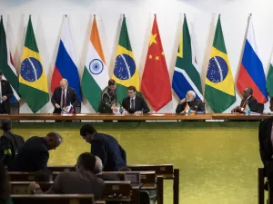 China's President Xi Jinping (L), Russia's President Vladimir Putin (2nd L), Brazil's President Jair Bolsonaro (C), India's Prime Minister Narendra Modi (2nd R), and South Africa's President Cyril Ramaphosa (R) attend to a meeting with members of the Business Council and management of the New Development Bank during the BRICS Summit in Brasilia, November 14, 2019. Pavel Golovkin / POOL / AFP