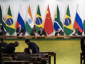 China's President Xi Jinping (L), Russia's President Vladimir Putin (2nd L), Brazil's President Jair Bolsonaro (C), India's Prime Minister Narendra Modi (2nd R), and South Africa's President Cyril Ramaphosa (R) attend to a meeting with members of the Business Council and management of the New Development Bank during the BRICS Summit in Brasilia, November 14, 2019. Pavel Golovkin / POOL / AFP