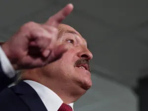 Belarus' President Alexander Lukashenko speaks with journalists as he votes at a polling station during Belarus' parliamentary election in Minsk on November 17, 2019. Sergei GAPON / AFP