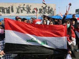 Iraqi demonstrators gather in the capital Baghdad's Tahrir square during ongoing anti-government demonstrations  (AFP)