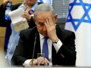 Israeli Prime Minister Benjamin Netanyahu gestures as he speaks during a meeting of the right-wing bloc at the Knesset (Israeli parliament) in Jerusalem on November 20, 2019. GALI TIBBON / AFP