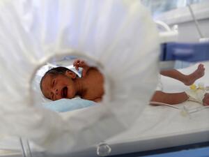 A malnourished newborn baby lies in an incubator at Al-Sabeen hospital in the Yemeni capital Sanaa on November 23, 2019. (AFP/ File Photo)