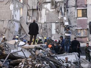 Rescue workers remove debris from a collapsed building in Thumane, northwest of capital Tirana, after an earthquake hit Albania, on November 26, 2019. (AFP/ File Photo)