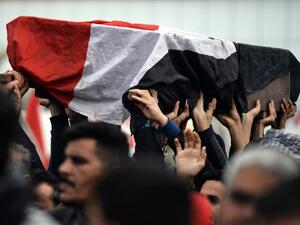 Young Iraqis carry the coffin of an anti-government demonstrator killed during protests a day earlier, during a funeral procession in the central holy shrine city of Najaf on November 29, 2019. Nearly 45 people were reportedly killed and hundreds wounded across Iraq yesterday, at least 16 of them in Najaf, a day after the torching of Iran's consulate there. Haidar HAMDANI / AFP