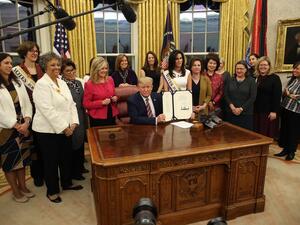 President Donald Trump poses after signing H.R. 2423, the Womens Suffrage Centennial Commemorative Coin Act, in the Oval Office at the White House on November 25, 2019 in Washington, DC. ( Mark Wilson/Getty Images/AFP)