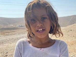 Zakura, pictured aged eight, is facing a race against time to avoid a traditional Bedouin fate in her region of being sold for marriage soon after she starts her periods  (dailymail/IvanVdovin)