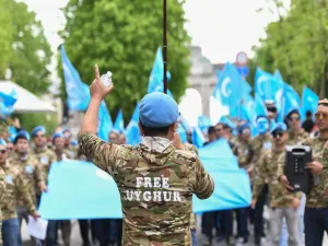Ethnic Uyghurs take part in a protest march asking for the European Union to call upon China to respect human rights in the Chinese Xinjiang region and asking for the closure of "re-education centers." (AFP/ File Photo)