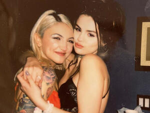 The girls shared a smooch after singing the song Anxiety together 