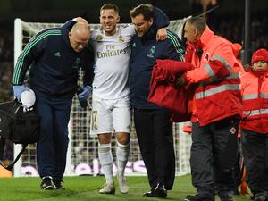 هازارد بعد تعرضه للإصابة