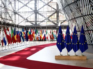 EU flags in EU Council building during the EU Summit. (Shutterstock/ File Photo)