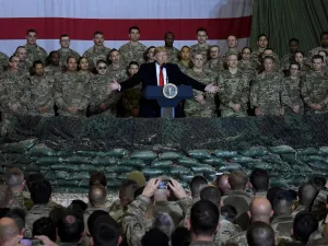 US President Donald Trump speaks to the troops during a surprise Thanksgiving day visit at Bagram Air Field, on November 28, 2019 in Afghanistan. Olivier Douliery / AFP