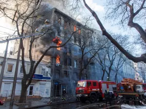 Firefighters extinguish a fire inside a college building in central Odessa on December 4, 2019. Ukrainian President Volodymyr Zelensky warned on December 5, 2019 that a deadly fire in the southern port city of Odessa could claim more victims, saying 14 people were still missing. Oleksandr GIMANOV / AFP