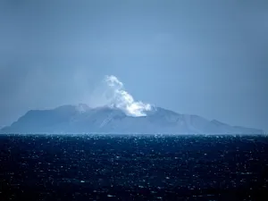 Steam rises from the White Island volcano in Whakatane on December 10, 2019, after a volcanic eruption the day before. New Zealand's Prime Minister Jacinda Ardern expressed "unfathomable grief" on December 10 after a volcanic eruption on a popular tourist island that is thought to have claimed 13 lives. Marty MELVILLE / AFP
