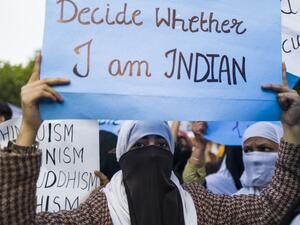 Protesters display placards during a demonstration against the Indian government's Citizenship Amendment Bill in New Delhi on December 14, 2019. (AFP/ File Photo)