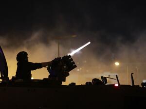 Lebanese riot police fire teargas canisters during clashes with anti-government demonstrators in the capital Beirut on December 14, 2019. ANWAR AMRO / SERVICES AFP / AFP