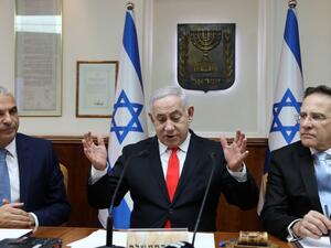 Israeli Prime Minister Benjamin Netanyahu (C) chairs the weekly cabinet meeting at his Jerusalem office on December 15, 2019. GALI TIBBON / POOL / AFP