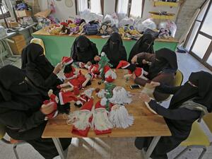 Palestinian artisans make Christmas toys at Zeina Association and Cooperative for Handicraft in Beit Hanun in the northern Gaza Strip on December 24, 2019. MOHAMMED ABED / AFP