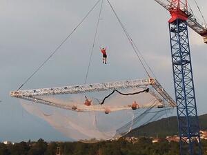 The trampoline was then suspended from a 140ft, 12-tonne crane that lifts the trampoline 50ft off the ground. (Daily Mail)