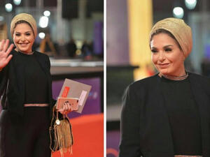 Sabrine wore a short skirt, blouse and blonde hair