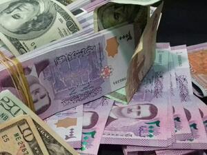 الأسد يصدر مرسوما تشريعيا يحدد عقوبة كل من يتعامل بغير الليرة السورية