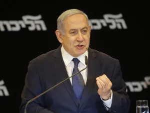 Israeli Prime Minister Benjamin Netanyahu speaks at a press conference regarding his intention to file a request to the Knesset for immunity from prosecution, in Jerusalem on January 1, 2020. GIL COHEN-MAGEN / AFP