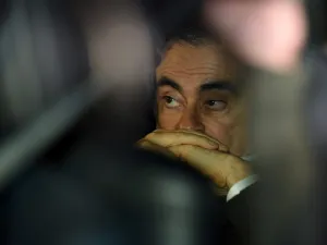 This file photo taken on March 6, 2019 shows former Nissan chairman Carlos Ghosn leaving his lawyers' offices after he was released earlier in the day from a detention centre after posting bail in Tokyo. Carlos Ghosn's escape from Japan is "unjustifiable" and he is thought to have left the country using "illegal methods", the Japanese justice minister said on January 5, 2020, in the first official public comments on the case. Kazuhiro NOGI / AFP