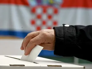 A man casts his ballot at a polling station during the presidential elections on January 5, 2020 in Zagreb, Croatia. Denis LOVROVIC / AFP