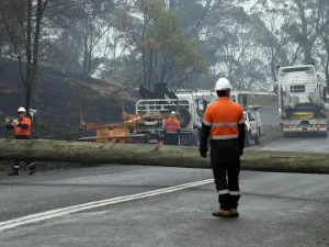Firefighters were racing to contain massive bushfires across southeastern Australia Tuesday amid easing conditions as another heatwave loomed, as officials said the damage bill for the months-long crisis had risen to almost half a billion dollars.  SAEED KHAN / AFP