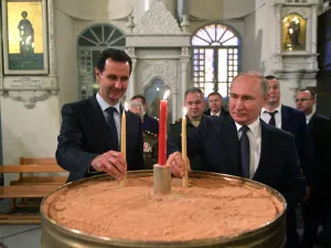 Russian President Vladimir Putin and Syrian President Bashar al-Assad visit the Mariamite Cathedral of Damascus, one of the oldest Greek Orthodox churches in the Syrian capital, in Damascus on January 7, 2020. Putin met his Syrian counterpart Bashar al-Assad during an unprecedented visit to Damascus as the prospect of war between Iran and the United States loomed over the region. Alexey DRUZHININ / SPUTNIK / AFP