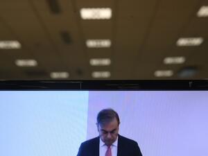 An image taken on a screen in Paris shows former Nissan chief Carlos Ghosn holding a press conference in Beirut on January 8, 2020, the first by the fugitive car magnate since his escape from trial in Japan. Olivier MORIN / AFP