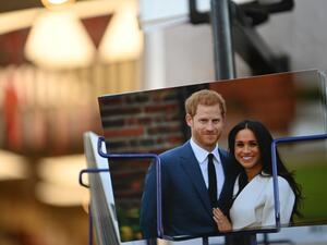 Royal memorabilia featuring Britain's Prince Harry, Duke of Sussex, and Meghan, Duchess of Sussex is displayed for sale in a store near Buckingham Palace in London on January 10, 2020. Prince Harry's wife Meghan has returned to Canada following the couple's bombshell announcement that they were quitting their frontline royal duties, it emerged Friday, as the monarch held urgent talks with her family to resolve the crisis. DANIEL LEAL-OLIVAS / AFP