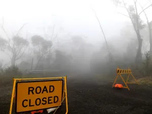 Thick fog mixed with bushfire smoke fills the sky in the Ruined Castle area of the Blue Mountains, some 75 kilometres from Sydney, on January 11, 2020. Massive bushfires in southeastern Australia have a "long way to go", authorities have warned, even as colder conditions brought some relief to exhausted firefighter and communities. SAEED KHAN / AFP