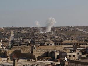 Smoke billows following a reported air strike by pro-regime forces in the town of Maaret Al-Numan in Syria's northwestern Idlib province on January 13, 2020. Abdulaziz KETAZ / AFP