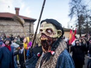 Masked revellers take part in a carnival procession through the south-western North Macedonian village of Vevcani, on January 13, 2020. The Vevcani carnival is 1.400 years old and is held every year on the eve of the feast of Saint Basil (January 14), which also marks the beginning of the New Year according to the Julian calendar, observed by the Macedonian Orthodox Church. Robert ATANASOVSKI / AFP