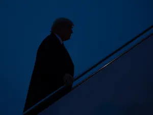 US President Donald Trump boards Air Force One prior to departure from Joint Base Andrews in Maryland, January 14, 2020, as he travels to hold a "Keep America Great" campaign rally in Milwaukee, Wisconsin. SAUL LOEB / AFP