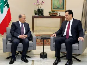 Lebanon's President Michel Aoun (L) meets with prime minister designate Hassan Diab at the presidential palace in Baabda, east of the capital Beirut, on January 21, 2020. AFP