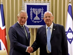 Britain's Prince Charles (L) shakes hands with Israeli President Reuven Rivlin at the presidential residence in Jerusalem, ahead of a meeting on the sidelines of the Fifth World Holocaust Forum at the Yad Vashem Holocaust memorial museum in Jerusalem on January 23, 2020. AFP
