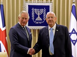 Britain's Prince Charles (L) shakes hands with Israeli President Reuven Rivlin at the presidential residence in Jerusalem, ahead of a meeting on the sidelines of the Fifth World Holocaust Forum at the Yad Vashem Holocaust memorial museum in Jerusalem on January 23, 2020. AFP