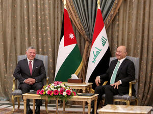 King Abdullah of Jordan visited Iraq last year to activate security agreements between the two countries. (AFP)
