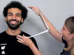 Egypt's Mohamed Salah in London taking several measurements for his wax sculpture. Madame Tussauds