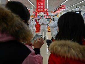 The virus has raised alarm globally with cases reported across Asia, Europe, the U.S. and Canada. AFP