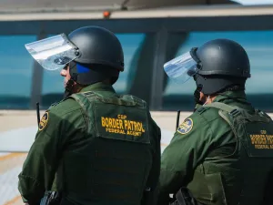 US Customs and Border Protection agents participate in a training exercise at a vehicle entry point along the border with Mexico on November 5, 2018, in Hidalgo, Texas. ( Andrew Cullen/AFP/Getty Images)