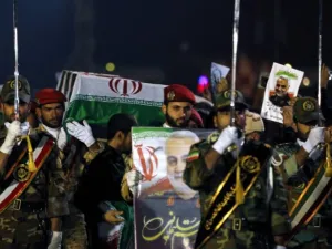 Military personnel carry the coffin of Iranian General Qasem Soleimani after his arrival at Ahvaz International Airport in southwestern Iran on January 5. Photo: Hossein Mersadi, AFP