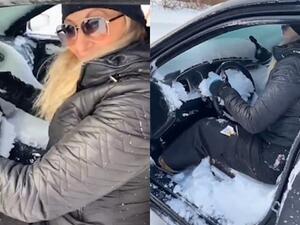 The vehicle is covered in a thick sheet of snow. St. John's Airport measured 30 inches on Friday - their record level of snowfall dating to 1942. (Twitter)