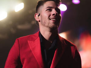 He had an unfortunate piece of food stuck in between his teeth