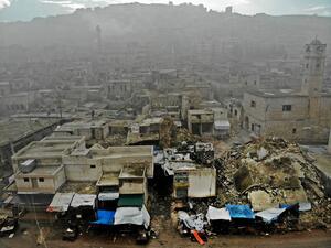 An aerial view taken on February 5, 2020, shows the aftermath of an air strike by pro-regime forces on the rebel-held town of Ariha in the northern countryside of Syria's Idlib province. Syrian regime forces pressed on with their offensive in the northwest that has displaced half a million people, despite heightened tensions with Turkey. Intensive aerial bombardment and ground fighting in the jihadist-dominated Idlib region since December have killed almost 300 civilians and triggered one of the largest wav