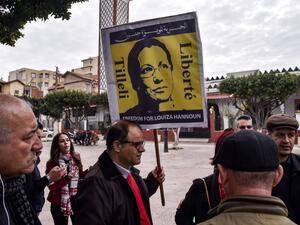 Supporters of Louisa Hanoune, head of Algeria's Workers' Party, gather for a demonstration in the city of Blida, about 45 kilometres southwest of the capital, on February 9, 2020, where Hanoune and Said Bouteflika, the jailed brother of the former president, are due to appear at a military tribunal. AFP
