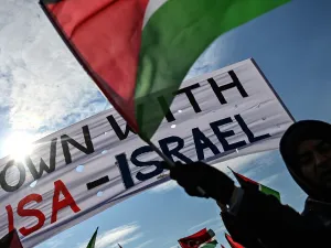 Demonstrators wave Turkish and Palestinian flags during a rally at Yenikapı Square, in Istanbul, to protest against the US-made peace plan, also known as the ‘Agreement of the Century’ Ozan KOSE / AFP