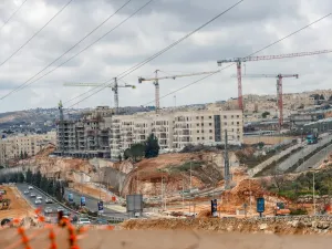 A picture taken on February 11, 2020 shows a view of ongoing construction work at Ramat Shlomo, a Jewish settlement in the Israeli-annexed eastern sector of Jerusalem. AHMAD GHARABLI / AFP