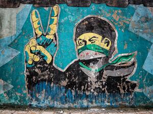 A picture taken on February 15, 2020, shows a mural inspired by the 2011 Syrian uprising in the deserted city of Kafranbel, south of Idlib city in the eponymous northwestern Syrian province, amid an ongoing pro-regime offensive. Omar HAJ KADOUR / AFP